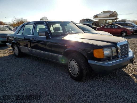 1986 Mercedes-Benz 560 with VIN WDBCA39DXGA233159, listed as a Copart auction lot 78498894 with 96,308 mi miles and Salvage Title. Bid and sale history available at DreamBid. Image 4.