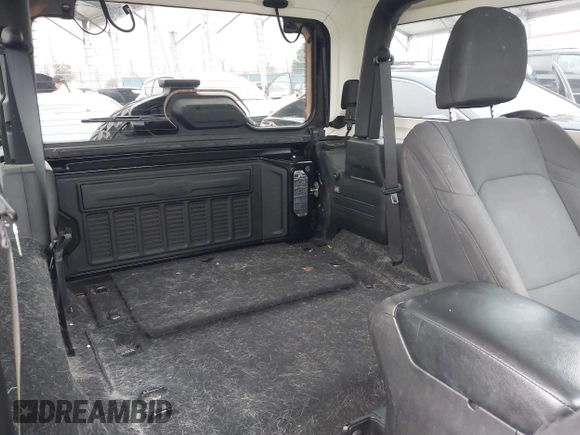 2021 Jeep Wrangler Sport with VIN 1C4GJXAN5MW627228, listed as a IAAI auction lot 42170010 with 56,965 mi miles and . Bid and sale history available at DreamBid. Image 8.