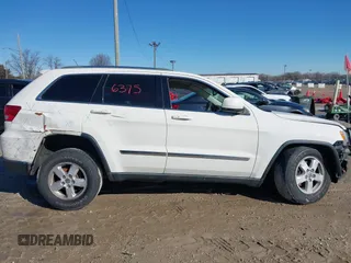 2012 Jeep Grand Cherokee Laredo with VIN 1C4RJFAGXCC224138, listed as a IAAI auction lot 41736375 with 133,383 mi miles. Bid and sale history available at carsss.com. Image 14.