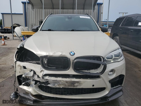 2016 BMW X5 M with VIN 5YMKT6C54G0R79100, listed as a Copart auction lot 55699044 with 106,772 mi miles. Bid and sale history available at carsss.com. Image 5.
