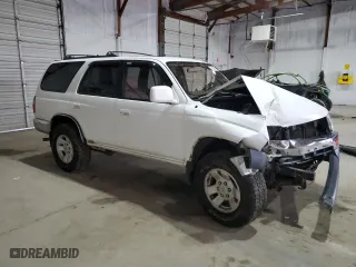 1998 Toyota 4Runner SR5 with VIN JT3HN86R3W0169984, listed as a Copart auction lot 85010594 with 184,178 mi miles and Salvage Title. Bid and sale history available at carsss.com. Image 4.