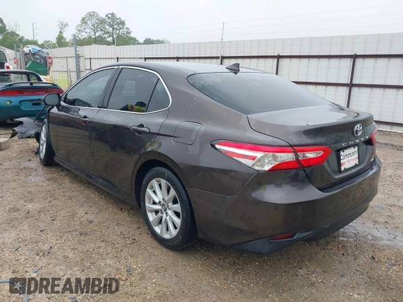 2020 Toyota Camry LE with VIN 4T1C11AK1LU320677, listed as a IAAI auction lot 41914421 with 94,291 mi miles. Bid and sale history available at carsss.com. Image 3.