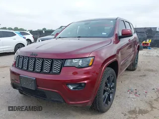 2018 Jeep Grand Cherokee Altitude with VIN 1C4RJEAGXJC281236, listed as a IAAI auction lot 42378899 with 102,276 mi miles and . Bid and sale history available at DreamBid. Image 2.