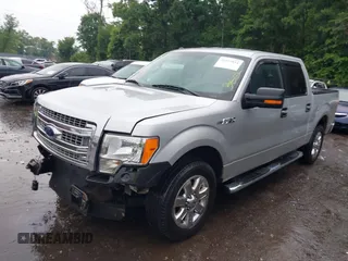 2013 Ford F-150 XL with VIN 1FTFW1CF5DKF63831, listed as a IAAI auction lot 39559854 with 125,721 mi miles and . Bid and sale history available at carsss.com. Image 2.