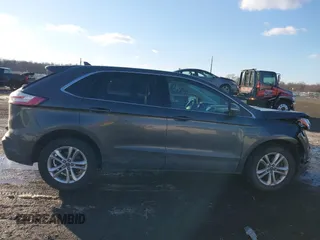 2019 Ford Edge SEL z VIN 2FMPK4J94KBB07837, wystawiony jako IAAI lot #41347294 z przebiegiem 90 668 mil mil oraz . Historia ofert i sprzedaży dostępna na DreamBid. Obrazek 13.