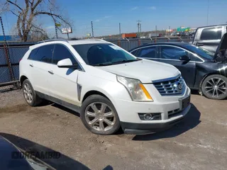 2014 Cadillac SRX Performance Collection with VIN 3GYFNCE36ES527809, listed as a IAAI auction lot 41790776 with 166,302 mi miles. Bid and sale history available at carsss.com. Image 13.