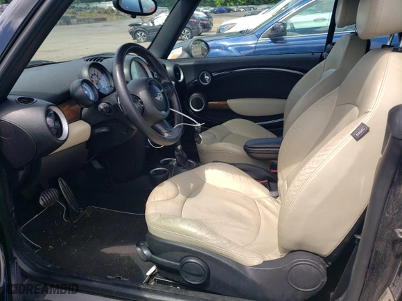 2012 MINI Cooper Convertible S with VIN WMWZP3C58CT550011, listed as a Copart auction lot 57512034 with 71,366 mi miles and Salvage Title. Bid and sale history available at carsss.com. Image 7.