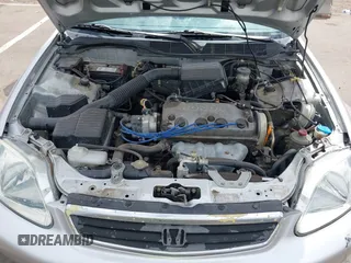 1999 Honda Civic LX with VIN JHMEJ6671XS003027, listed as a IAAI auction lot 41825146 with 197,764 mi miles and . Bid and sale history available at DreamBid. Image 10.