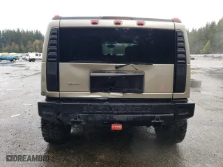 2003 Hummer H2 with VIN 5GRGN23U73H111109, listed as a Copart auction lot 76388144 with 160,179 mi miles and Salvage Title. Bid and sale history available at carsss.com. Image 6.