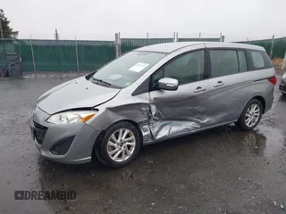 2014 Mazda Mazda5 Sport with VIN JM1CW2BL8E0162982, listed as a IAAI auction lot 41971275 with 85,990 mi miles. Bid and sale history available at carsss.com. Image 2.