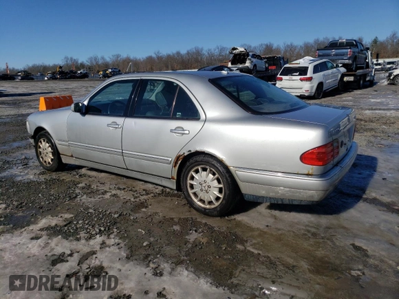 2000 Mercedes-Benz E-Class with VIN WDBJF82J5YX030071, listed as a Copart auction lot 42430025 with 122,612 mi miles and Salvage Title. Bid and sale history available at carsss.com. Image 2.