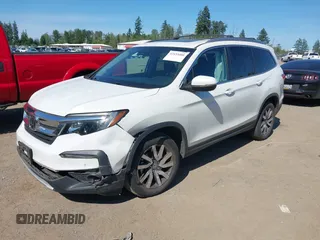 2020 Honda Pilot EX-L z VIN 5FNYF6H56LB010316, wystawiony jako IAAI lot #42433400 z przebiegiem 48 764 mil mil oraz . Historia ofert i sprzedaży dostępna na DreamBid. Obrazek 2.