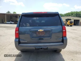 2020 Chevrolet Tahoe LT with VIN 1GNSKBKC0LR260766, listed as a Copart auction lot 61465725 with 104,850 mi miles and Salvage title. Bid and sale history available at DreamBid. Image 6.