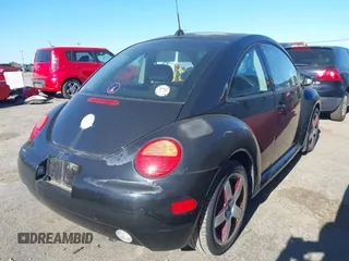 2005 Volkswagen New Beetle Coupe GLS with VIN 3VWCK31C45M404762, listed as a IAAI auction lot 41428782 with 135,706 mi miles. Bid and sale history available at carsss.com. Image 4.