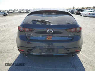 2020 Mazda 3 with VIN JM1BPALM9L1159882, listed as a Copart auction lot 61765925 with 59,494 mi miles and Salvage title. Bid and sale history available at DreamBid. Image 6.