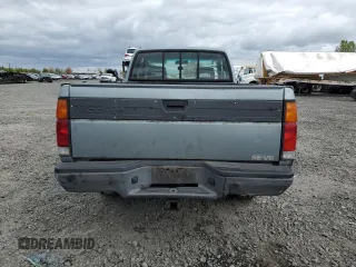 1993 Nissan Frontier SE z VIN 1N6HD16Y0PC408188, wystawiony jako Copart lot #71028394 z przebiegiem 258 939 mil mil oraz Szkoda całkowita • Salvage title. Historia ofert i sprzedaży dostępna na DreamBid. Obrazek 6.
