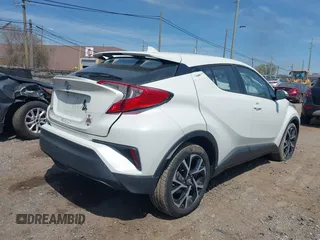 2018 Toyota C-HR XLE z VIN NMTKHMBX2JR026180, wystawiony jako IAAI lot #42156129 z przebiegiem 77 795 mil mil oraz . Historia ofert i sprzedaży dostępna na DreamBid. Obrazek 4.