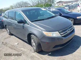 2013 Honda Odyssey EX-L with VIN 5FNRL5H65DB011071, listed as a IAAI auction lot 41992265 with 192,624 mi miles and . Bid and sale history available at DreamBid. Image 1.