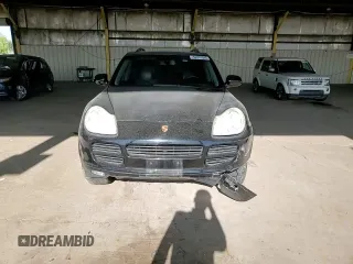 2006 Porsche Cayenne S with VIN WP1AB29P56LA66639, listed as a Copart auction lot 52097595 with 180,827 mi miles and Salvage title. Bid and sale history available at DreamBid. Image 10.
