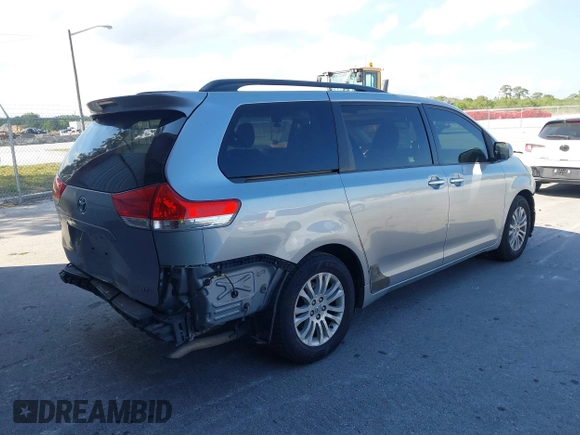 2011 Toyota Sienna XLE AAS with VIN 5TDYK3DC5BS148776, listed as a IAAI auction lot 41525078 with 177,154 mi miles and . Bid and sale history available at DreamBid. Image 4.