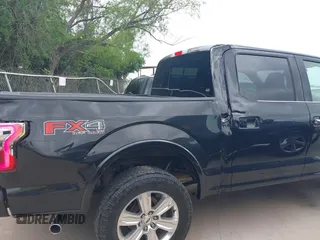 2015 Ford F-150 XLT with VIN 1FTEW1EG4FFC91835, listed as a IAAI auction lot 42126301 with 142,733 mi miles. Bid and sale history available at carsss.com. Image 6.