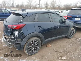 2017 Mazda CX-3 Touring z VIN JM1DKFC75H0173127, wystawiony jako IAAI lot #41614605 z przebiegiem 101 963 mil mil oraz . Historia ofert i sprzedaży dostępna na DreamBid. Obrazek 4.
