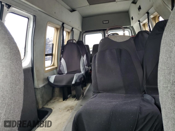 2003 Ford Econoline Cargo with VIN 1FDNS24L63HB98083, listed as a Copart auction lot 65953715 with 121,326 mi miles and Salvage title. Bid and sale history available at DreamBid. Image 10.