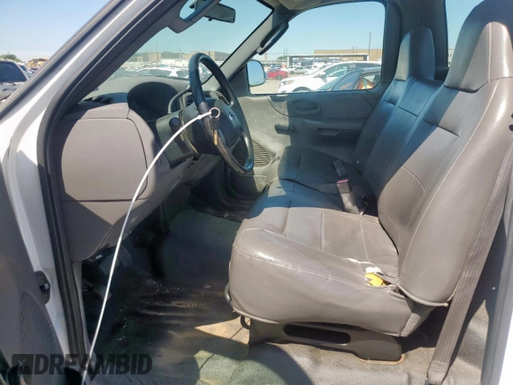 2003 Ford F-150 XL z VIN 2FTPF17ZX3CA65314, wystawiony jako Copart lot #56379215 z przebiegiem 112 475 mil mil oraz Czysty tytuł • Clean title. Historia ofert i sprzedaży dostępna na DreamBid. Obrazek 7.