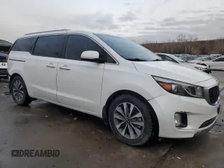 2015 Kia Sedona SX with VIN KNDMC5C19F6032915, listed as a Copart auction lot 82626784 with 135,594 mi miles and Salvage Title. Bid and sale history available at carsss.com. Image 4.