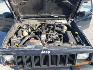 2000 Jeep Cherokee Classic with VIN 1J4FF58S3YL171454, listed as a Copart auction lot 42945485 with 218,721 mi miles and Salvage Title. Bid and sale history available at carsss.com. Image 13.