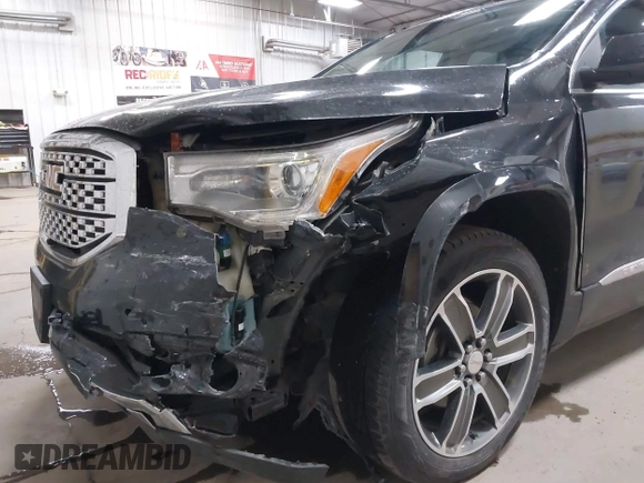 2019 GMC Acadia Denali with VIN 1GKKNXLS0KZ112252, listed as a IAAI auction lot 42293931 with 52,636 mi miles and . Bid and sale history available at DreamBid. Image 6.