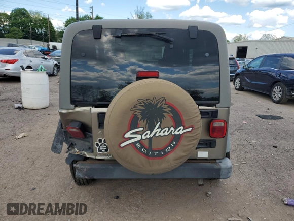 2004 Jeep Wrangler Sahara with VIN 1J4FA59SX4P791038, listed as a Copart auction lot 56154455 with 193,693 mi miles and Salvage title. Bid and sale history available at DreamBid. Image 6.