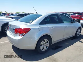2014 Chevrolet Cruze LS z VIN 1G1PA5SH6E7468916, wystawiony jako IAAI lot #42282737 z przebiegiem 120 129 mil mil oraz . Historia ofert i sprzedaży dostępna na DreamBid. Obrazek 4.