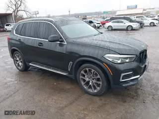 2023 BMW X5 xDrive40i with VIN 5UXCR6C03P9P62891, listed as a IAAI auction lot 41492392 with 51,471 mi miles. Bid and sale history available at carsss.com. Image 1.