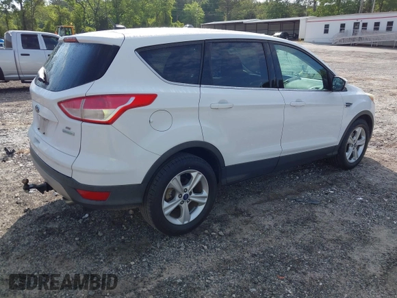2014 Ford Escape SE with VIN 1FMCU0GXXEUC64892, listed as a IAAI auction lot 42101842 with 128,932 mi miles and . Bid and sale history available at DreamBid. Image 4.