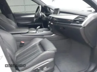 2018 BMW X6 sDrive35i with VIN 5UXKU0C56J0G81224, listed as a IAAI auction lot 41734077 with 121,145 mi miles. Bid and sale history available at carsss.com. Image 5.