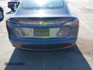2023 Tesla Model 3 Long Range z VIN 5YJ3E1EB7PF704061, wystawiony jako IAAI lot #42079045 z przebiegiem 4 012 mil mil oraz . Historia ofert i sprzedaży dostępna na DreamBid. Obrazek 16.