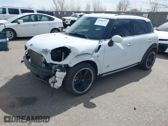 2016 MINI Countryman S with VIN WMWZC5C57GWU22015, listed as a IAAI auction lot 41806547 with 65,124 mi miles and . Bid and sale history available at DreamBid. Image 18.