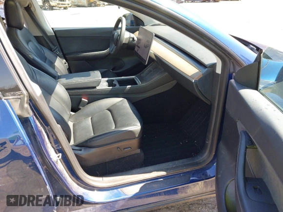 2021 Tesla Model Y Long Range with VIN 5YJYGAEE1MF207948, listed as a IAAI auction lot 41779570 with 100,859 mi miles. Bid and sale history available at carsss.com. Image 5.