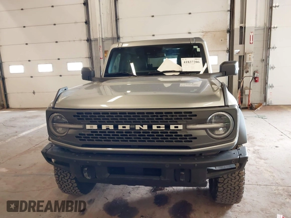 2024 Ford Bronco Badlands z VIN 1FMEE9BP6RLA08116, wystawiony jako IAAI lot #41837206 z przebiegiem 7807 mil mil oraz . Historia ofert i sprzedaży dostępna na DreamBid. Obrazek 12.
