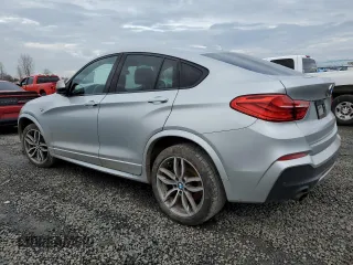 2017 BMW X4 M40i with VIN 5UXXW7C57H0U25268, listed as a Copart auction lot 40370884 with 99,387 mi miles. Bid and sale history available at carsss.com. Image 2.