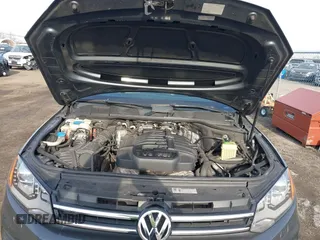 2014 Volkswagen Touareg Sport z VIN WVGEF9BP9ED010718, wystawiony jako IAAI lot #41786403 z przebiegiem 149 569 mil mil oraz . Historia ofert i sprzedaży dostępna na DreamBid. Obrazek 10.