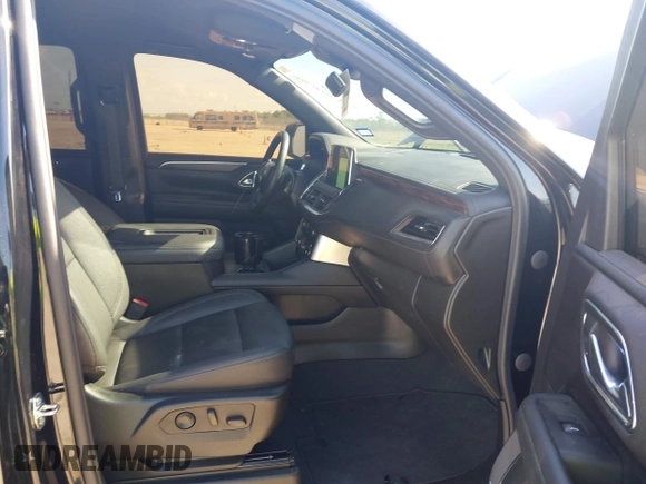 2023 Chevrolet Tahoe LT z VIN 1GNSCNKDXPR477061, wystawiony jako IAAI lot #42225743 z przebiegiem 57 077 mil mil oraz . Historia ofert i sprzedaży dostępna na DreamBid. Obrazek 5.