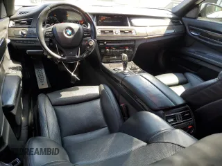 2015 BMW 7 Series 750i z VIN WBAYA8C53FG197751, wystawiony jako Copart lot #56249135 z przebiegiem 98 514 mil mil oraz Szkoda całkowita • Salvage title. Historia ofert i sprzedaży dostępna na DreamBid. Obrazek 8.