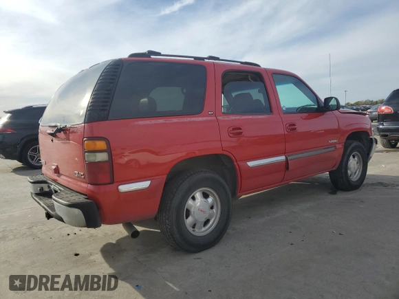 2000 GMC Yukon SLT with VIN 1GKEC13T3YJ141423, listed as a Copart auction lot 82344364 with 224,313 mi miles and Salvage Title. Bid and sale history available at carsss.com. Image 3.