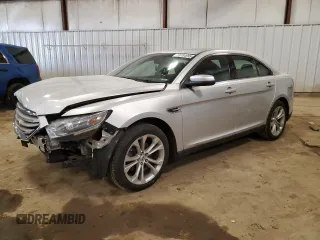 2013 Ford Taurus SEL z VIN 1FAHP2E82DG174647, wystawiony jako Copart lot #53784995 z przebiegiem Nie podano mil oraz Szkoda całkowita • Salvage title. Historia ofert i sprzedaży dostępna na DreamBid. Obrazek 1.
