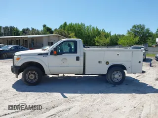 2014 Ford Super Duty F-250 SRW XL with VIN 1FDBF2B67EEA49254, listed as a IAAI auction lot 42136208 with 209,139 mi miles. Bid and sale history available at carsss.com. Image 14.