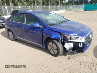 2022 Hyundai Ioniq SE z VIN KMHC75LC5NU269523, wystawiony jako IAAI lot #42218132 z przebiegiem 11 451 mil mil oraz . Historia ofert i sprzedaży dostępna na DreamBid. Obrazek 1.
