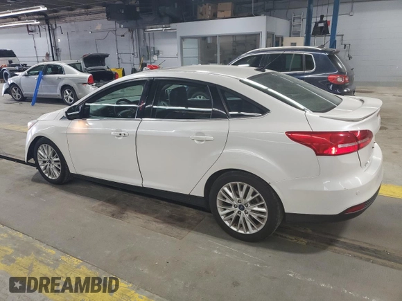 2017 Ford Focus Titanium with VIN 1FADP3J25HL213184, listed as a Copart auction lot 61653155 with 120,883 mi miles and Clean title. Bid and sale history available at DreamBid. Image 2.