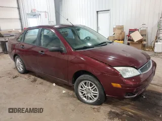 2007 Ford Focus S z VIN 1FAFP34N27W313853, wystawiony jako IAAI lot #41491294 z przebiegiem Nie podano mil oraz . Historia ofert i sprzedaży dostępna na DreamBid. Obrazek 1.
